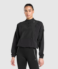 Running 1/4 Zip Track Top Black