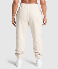 Lifting Essentials Graphic Brushed Oversized Joggers Oat White