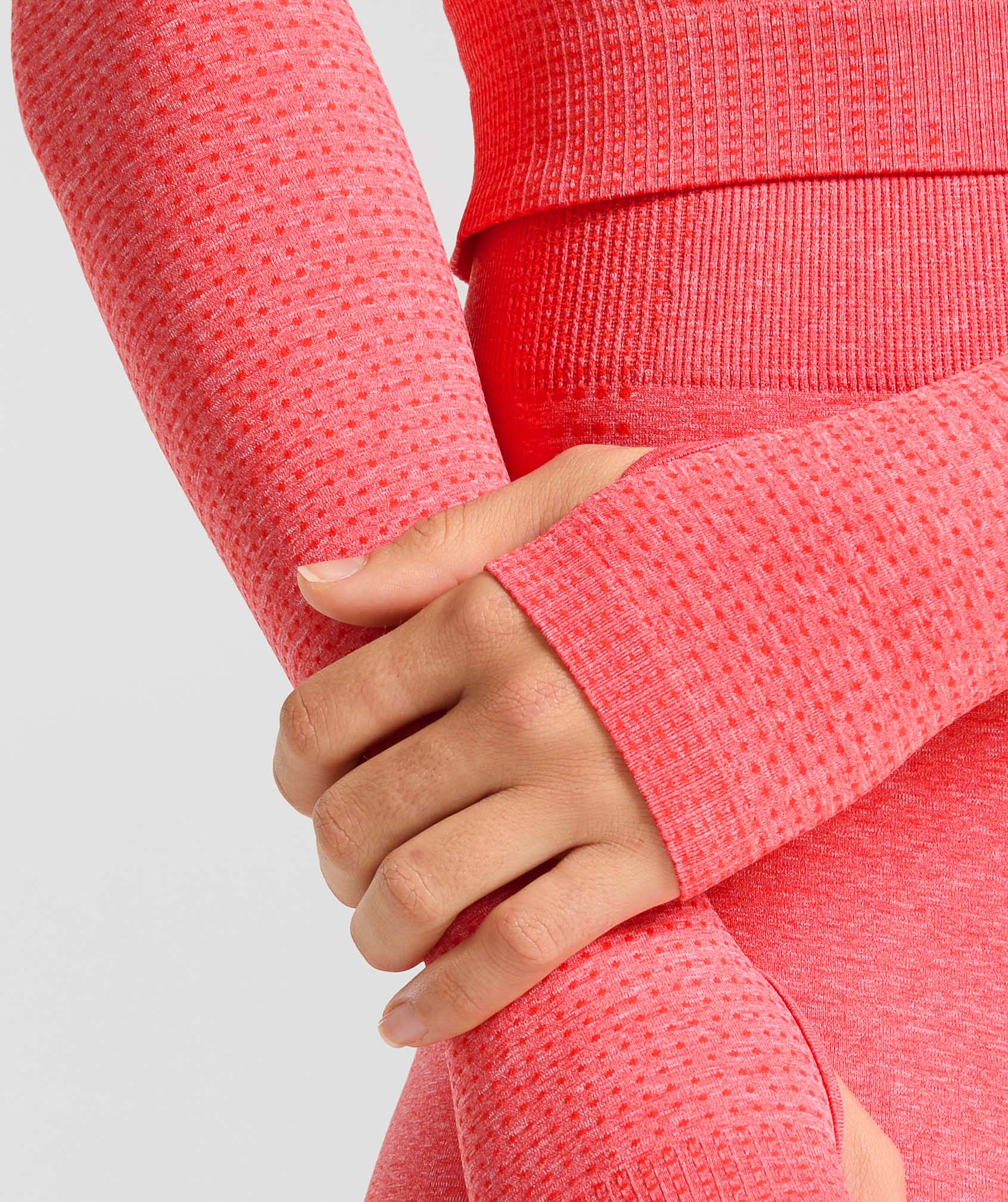 Vital Long Sleeve Cut Out Top Coral Red Marl