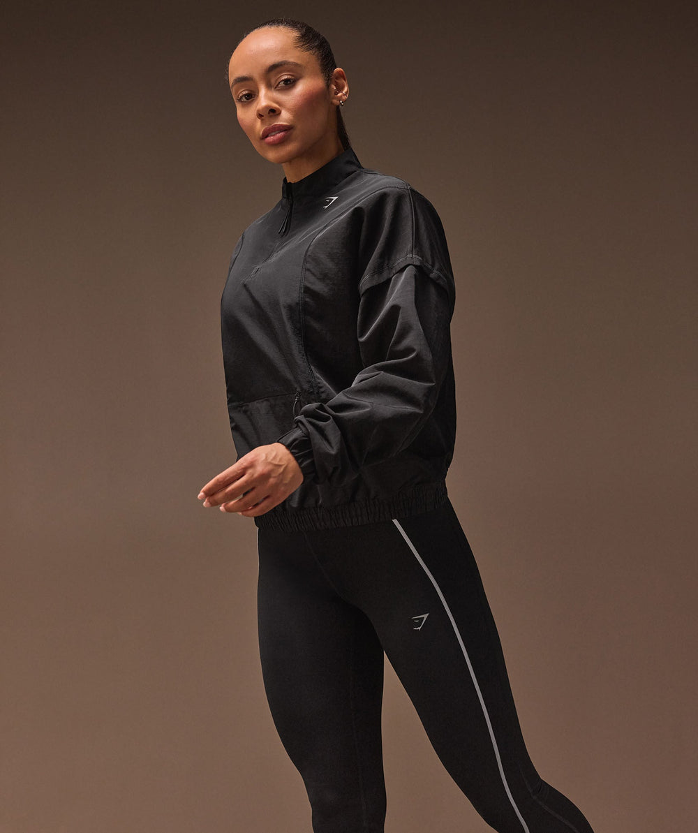 Running 1/4 Zip Track Top Black
