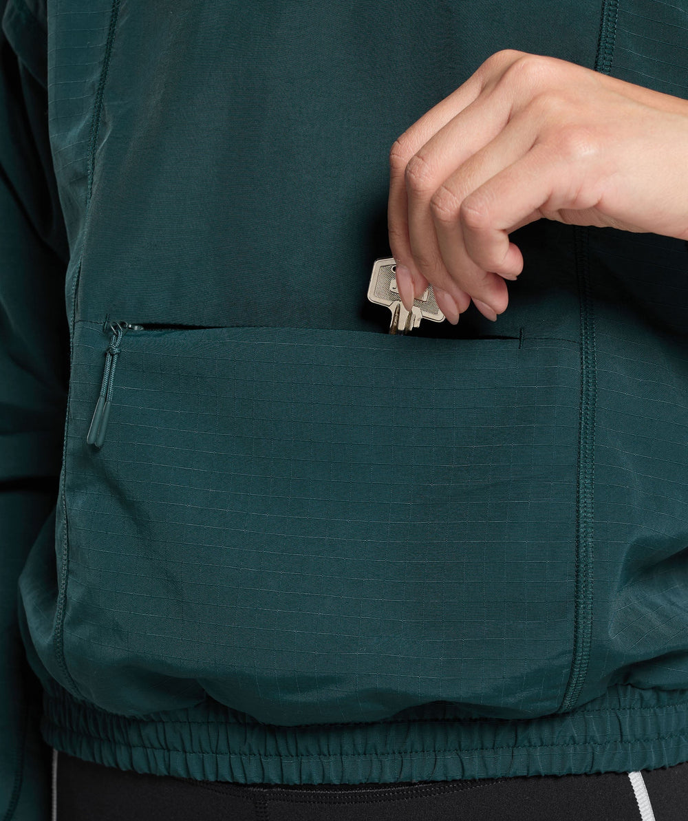Running 1/4 Zip Track Top Strong Teal
