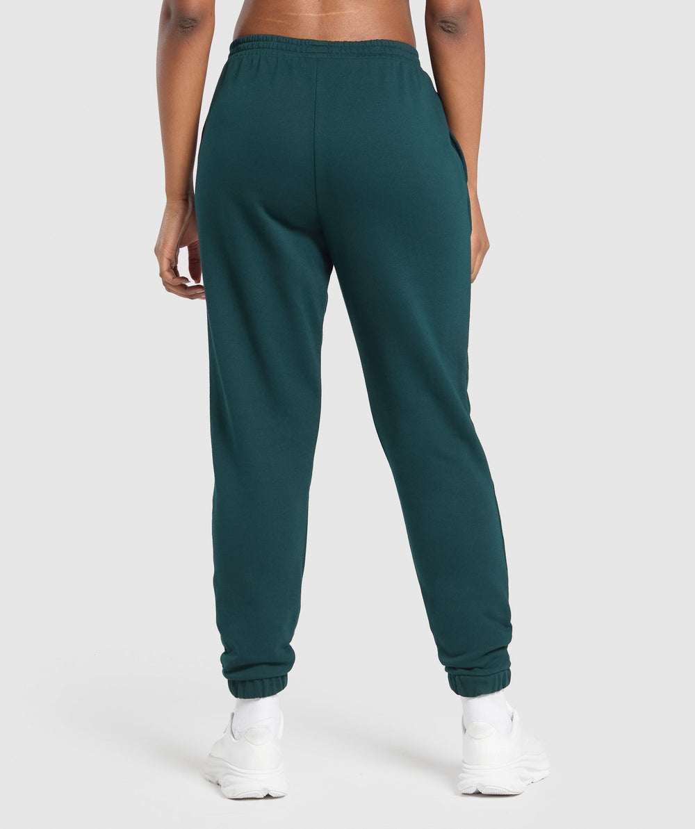 Running Graphic Joggers Strong Teal